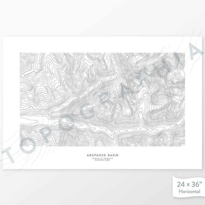 Example topographic map print of the Arapahoe Basin, Colorado ski area. Art uses horizontal orientation. Print shows landscape of the area using contour lines. On the artwork is a title and concise info of location and elevation.
