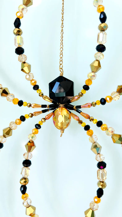 Gilded Shadow – Black & Gold Beaded Spider Suncatcher