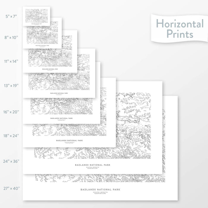 Available sizes for Badlands National Park topographic maps. 5x7, 8x10, 11x14, 16x20, 18x24, 24x36, and 27x40 posters shown. as black and white prints on a gray background.