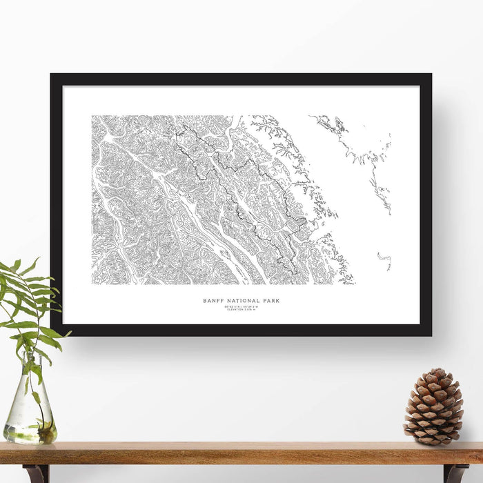 Framed travel art of Banff National Park, featuring topography map art in black and white.