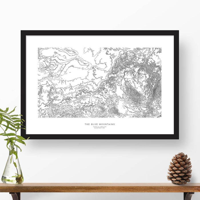 Framed black and white print of the Blue Mountains topography art. Text can be added to create a custom map poster as a travel gift.