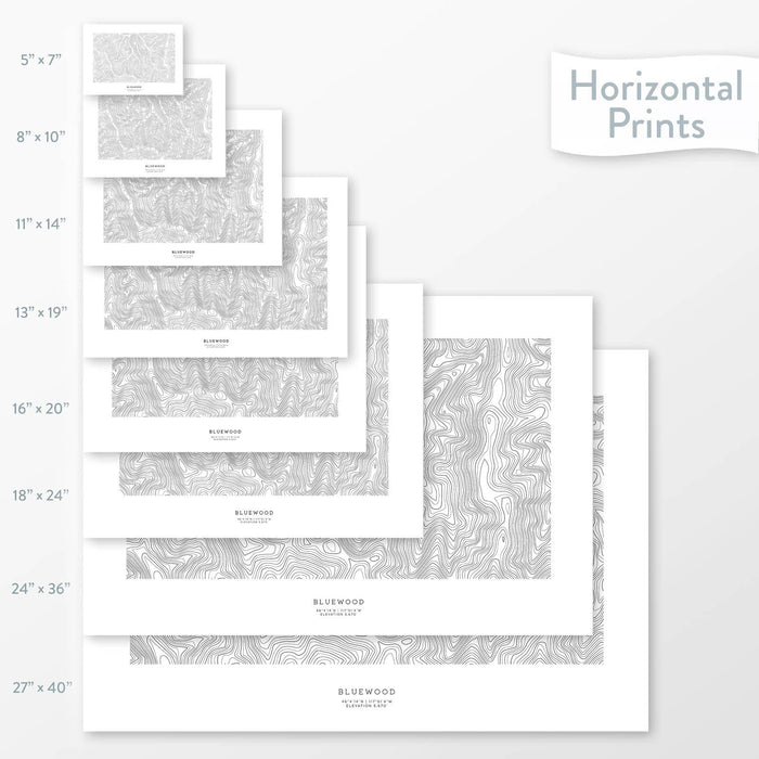 Available sizes for Bluewood ski area topographic maps. 5x7, 8x10, 11x14, 16x20, 18x24, 24x36, and 27x40 posters shown. as black and white prints on a gray background.