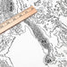Close-up of black labels and contour lines for Colorado 14ers poster with map art.