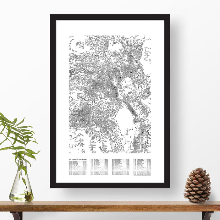 Colorado 14ers topographic map poster, 24"x36", in a vertical orientation, with a black solid wood ready-to-hang frame. The legend lists all 58 of Colorado's tallest mountains with elevations and a checklist to mark progress on summiting.