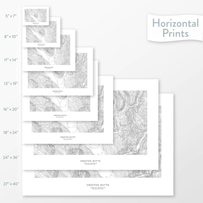 Available sizes for Crested Butte, Colorado topographic maps. 5x7, 8x10, 11x14, 16x20, 18x24, 24x36, and 27x40 posters shown. as black and white prints on a gray background.