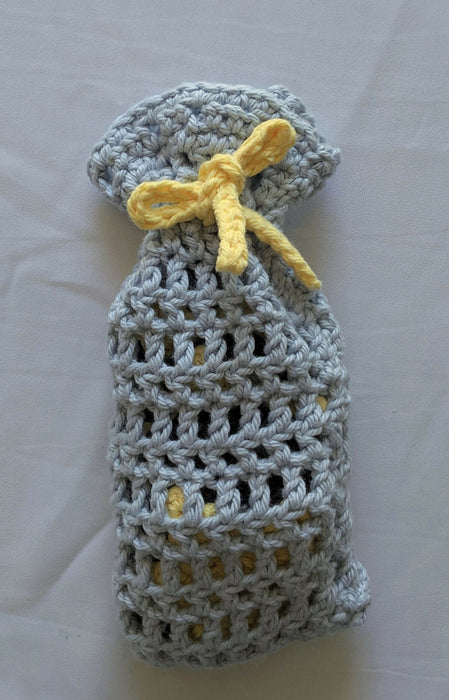 Photograph of the stars and moons scrubbies in their matching bag.