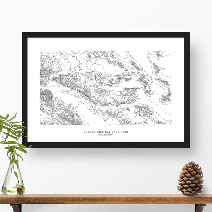 Joshua Tree National Park topographic map art poster with black frame.
