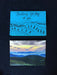 Envelope features photograph of mountains receding into the skyline. Card features abstracted reflection of envelope with the words thinking fondly of you written in the sky.