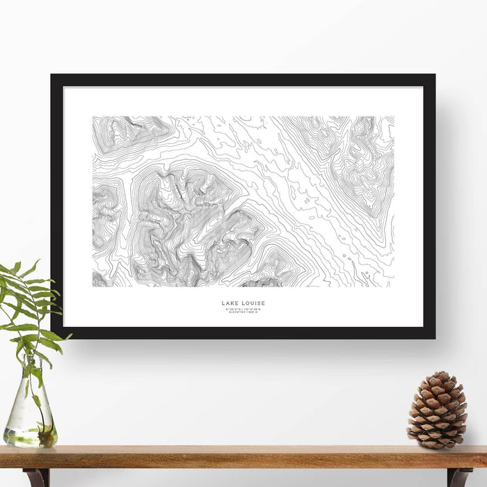 Framed travel art of Lake Louise, Banff National Park, Alberta, Canada featuring topography map art in black and white.