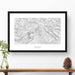 Map wall decor in a black frame. Contour lines of Mount Baker, Washington are drawn on a white background. Text  below the map can be customized to create custom adventure art.