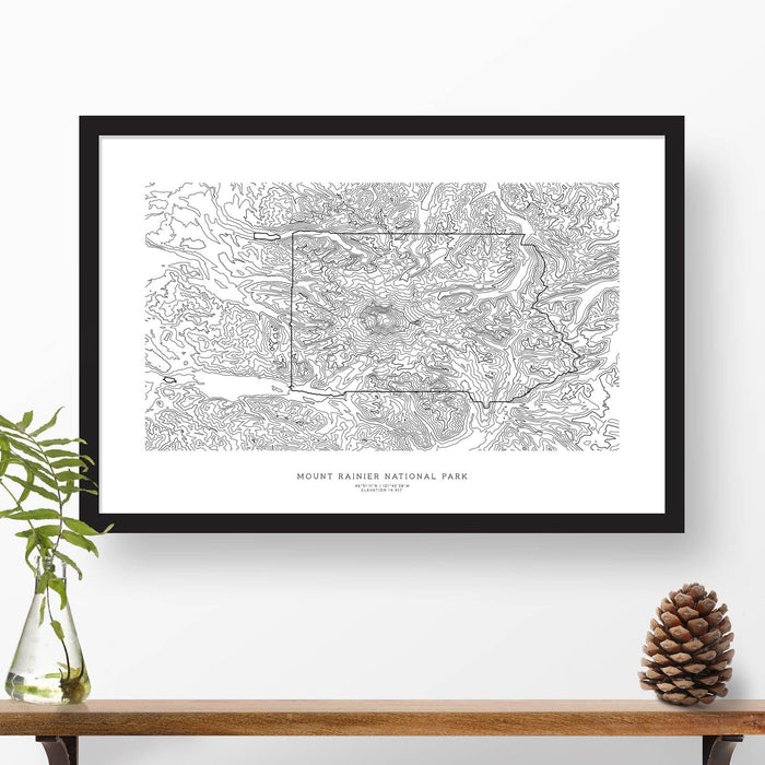 Framed black and white print of Mount Rainier National Park topography art. Text can be added to create a custom map poster as a travel gift.