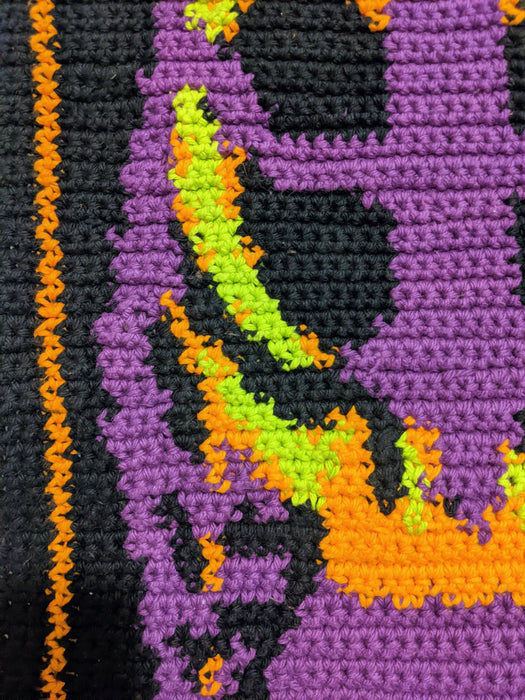 Close-up photograph of the pattern sample, focused on the ribcage.