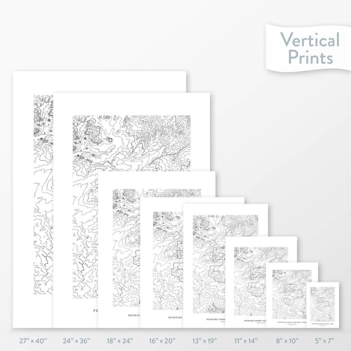 Available sizes for Petrified Forest National Park topographic maps. 5x7, 8x10, 11x14, 16x20, 18x24, 24x36, and 27x40 posters shown. as black and white prints on a gray background.