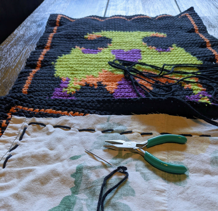 Photograph of the pattern sample while the backing fabric was being sewn onto it.