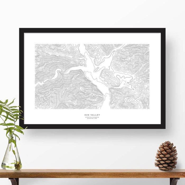 Framed black and white print of Sun Valley, Idaho with topography art.