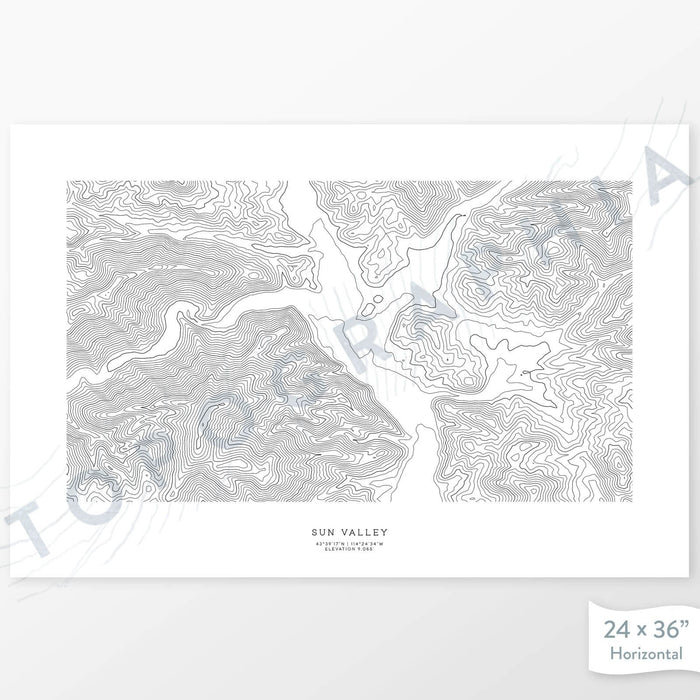 Example topographic map print of the Sun Valley, Idaho ski area. Art uses horizontal orientation. Print shows landscape of the area using contour lines. On the artwork is a title and concise info of location and elevation.