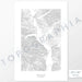 Example art map print of the Sun Valley, Idaho ski area. Art uses verticle orientation. Print shows landscape of the area using elevation data. On the artwork is a title and concise info of location and elevation. Custom map decor