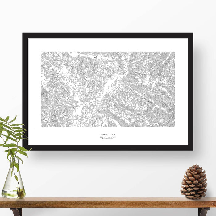 Framed black and white print of Whistler-Blackcomb Ski Resort topography art. Text can be added to create a custom map poster as a travel gift.