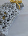 Close-up photograph of the stars and moon bag.