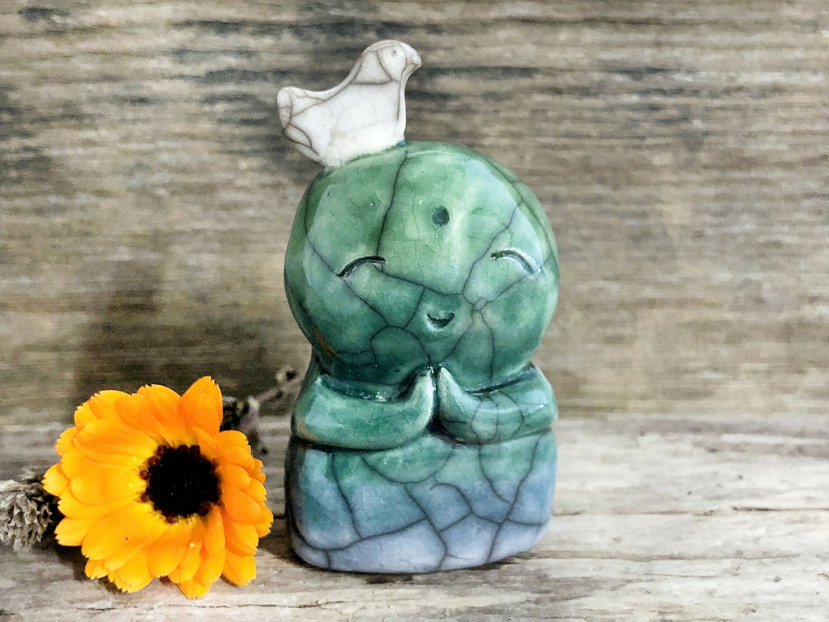 Jizo with bird sculpture, Shinto nature spirit guardian Ar...