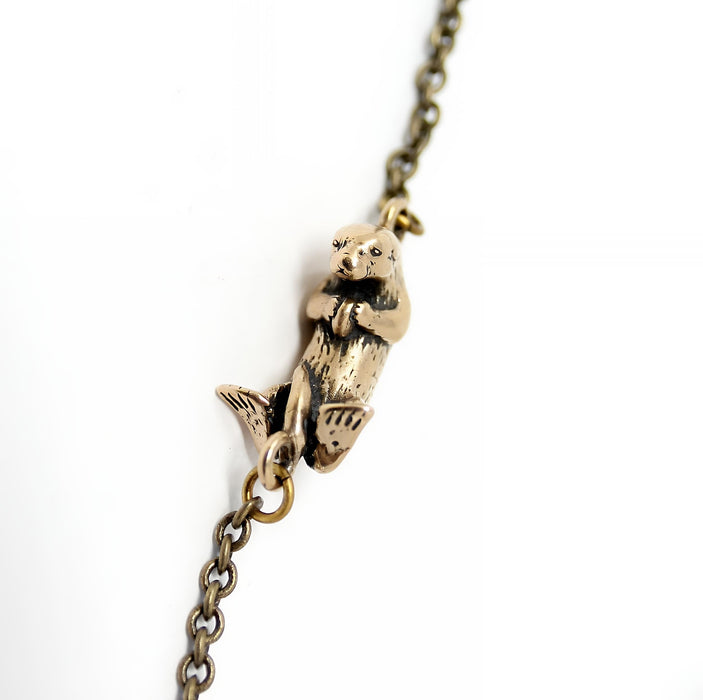 Floating Otter Necklace – Handcrafted Bronze Otter Pendant With Claw Clasp