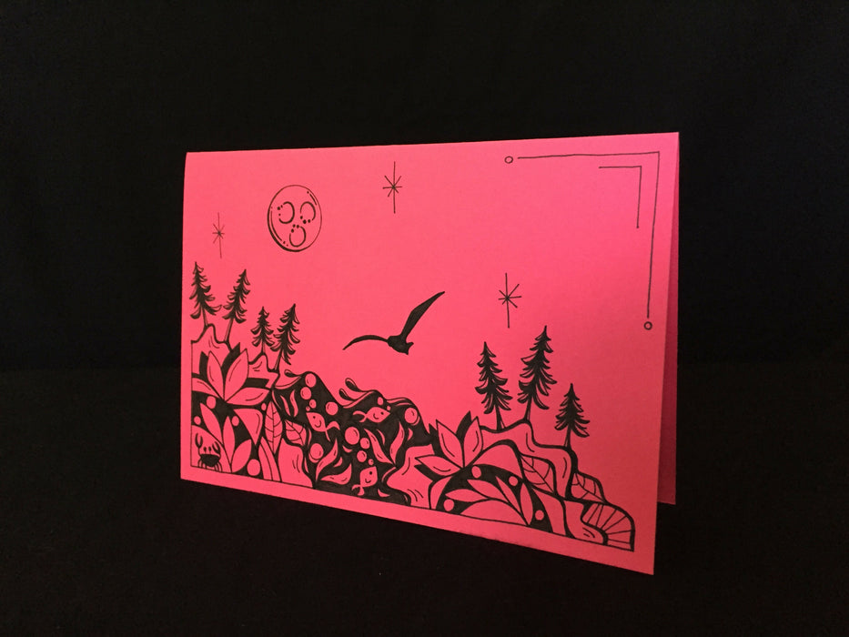 Card features evening nature scene with fish, crab, and seagull on pink paper.
