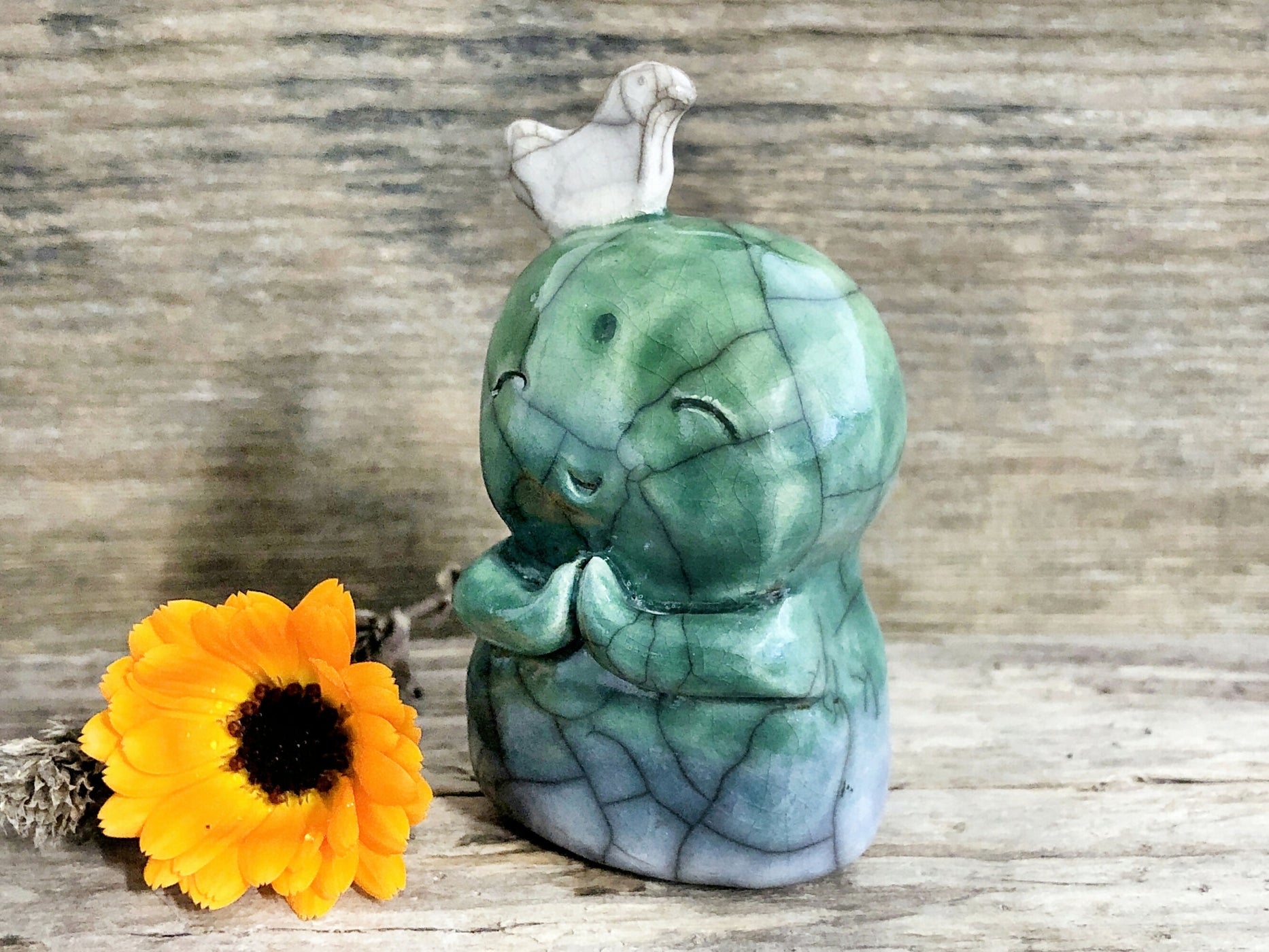 Jizo with bird sculpture, Shinto nature spirit guardian Ar...