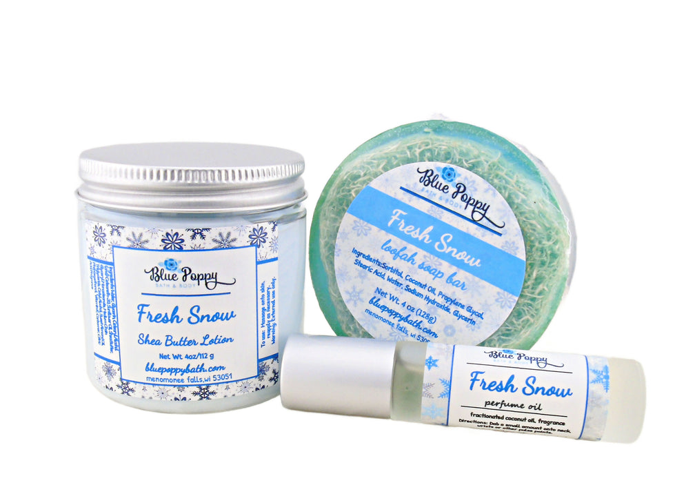 fresh snow bath and body gift set with soap, lotion and perfume.  wrapped in holiday gift bag with ribbon.
