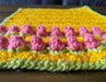 Photograph of the altar cloth without anything on it, taken from a different angle.