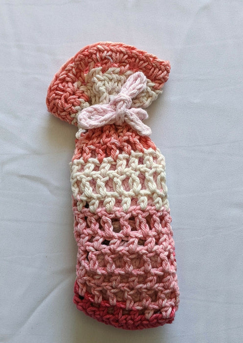 Photograph of the pink and brown face scrubbies bag.