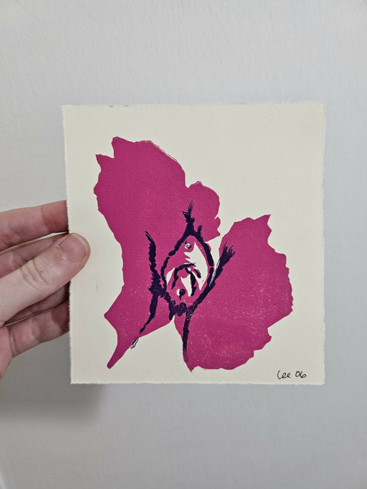 dick print in magenta and violet