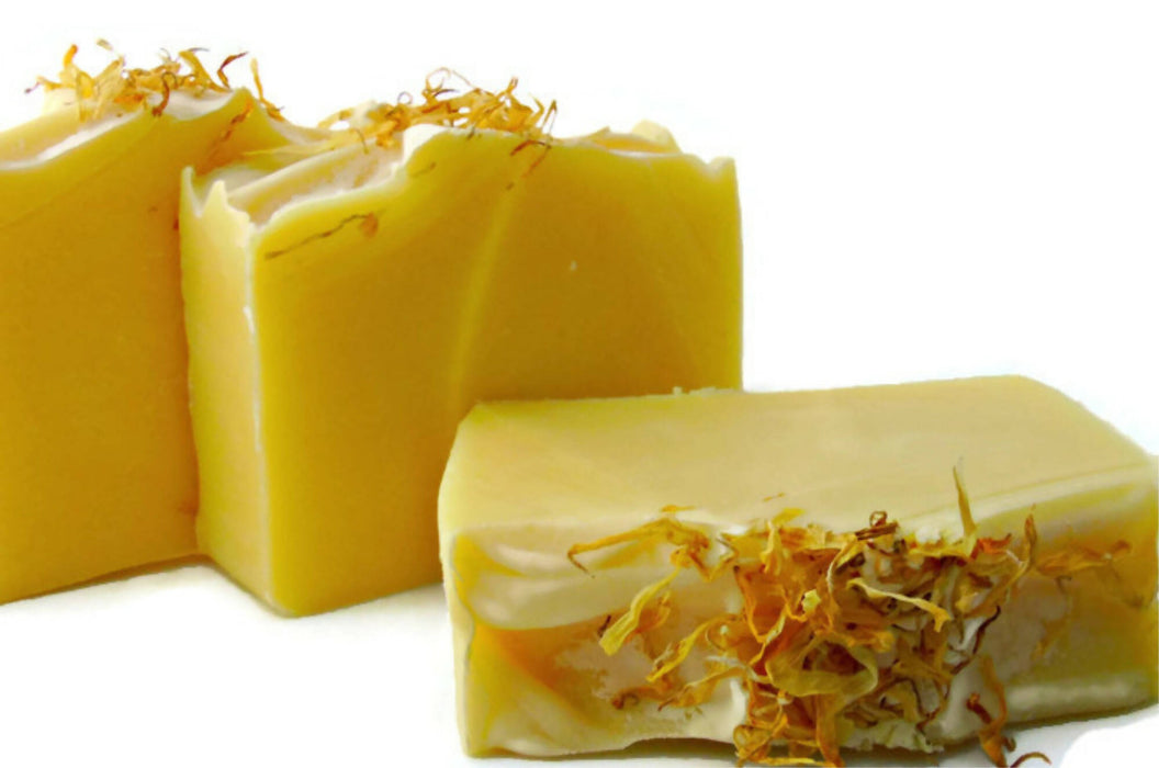 handmade soap bar in lemongrass essential oil scent colored yellow