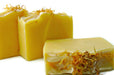 handmade soap bar in lemongrass essential oil scent colored yellow