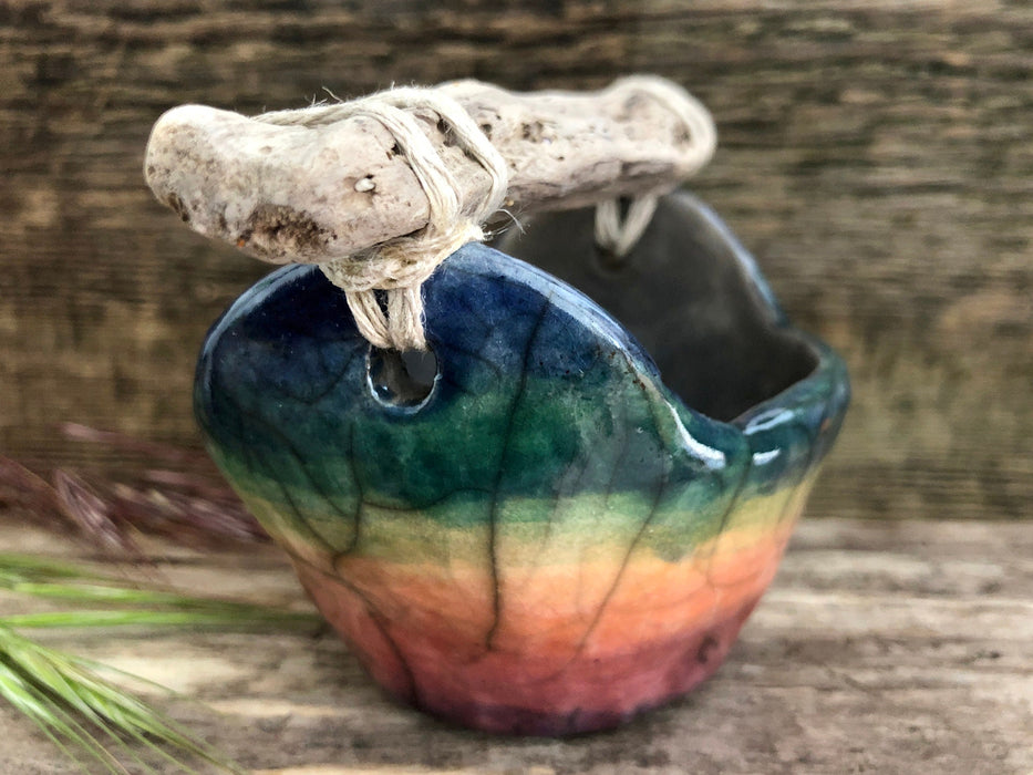 Rainbow ceramic and driftwood bucket raku sculpture
