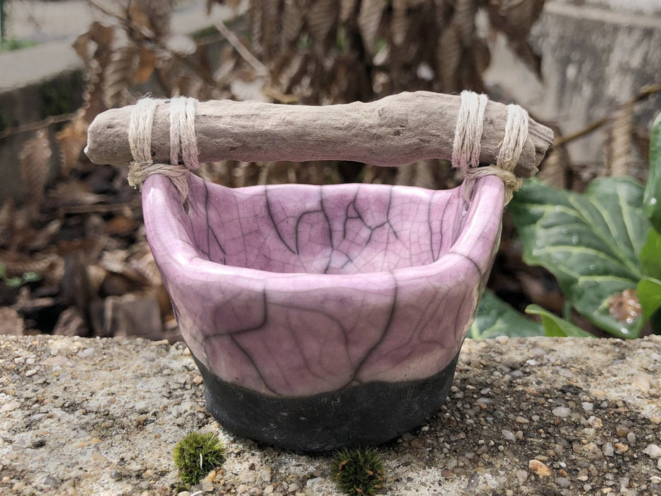 Cute raku ceramic and driftwood bucket sculpture