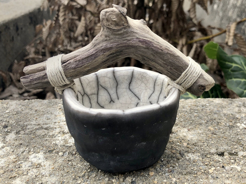 Raku ceramic and driftwood bucket sculpture