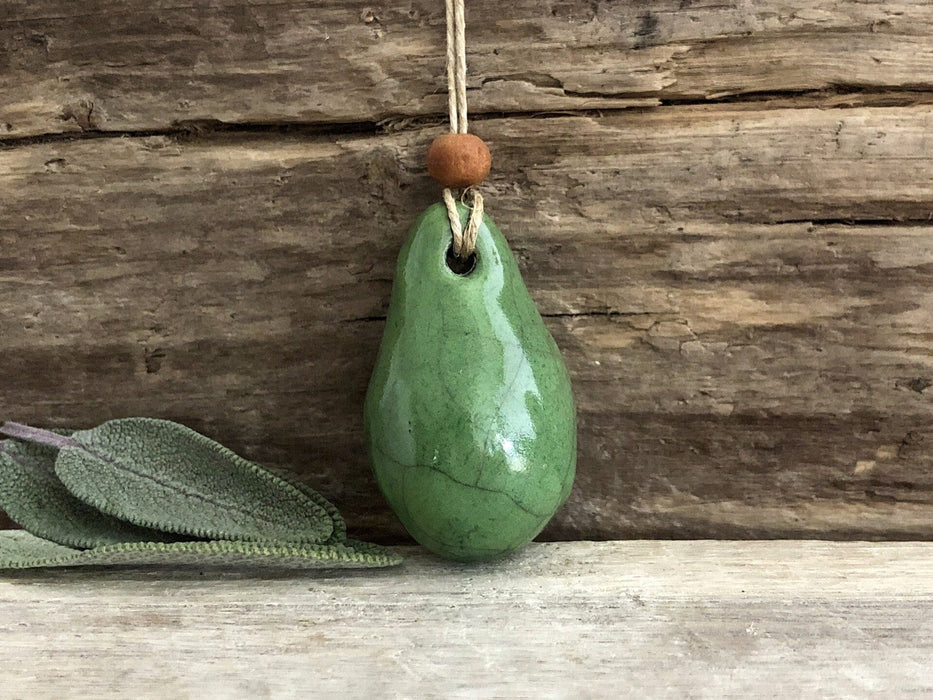 Calming worry and sensory pendant (green) w/ sandalwood in raku ceramic